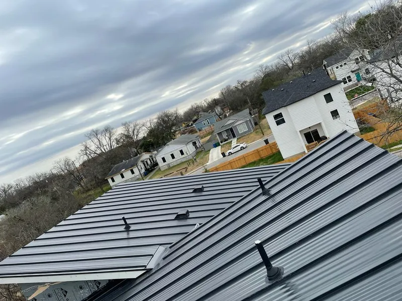 Standing seam metal roof panels with vents for Skylight Repair in Pelham